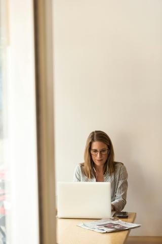 woman sitting at a laptop