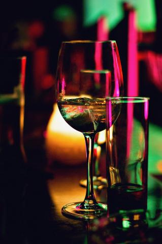 wine and cocktail glasses, festive background