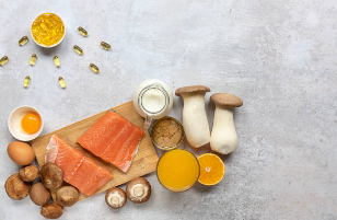 Image of salmon, cheese, mushrooms, eggs, vitamin D supplements 