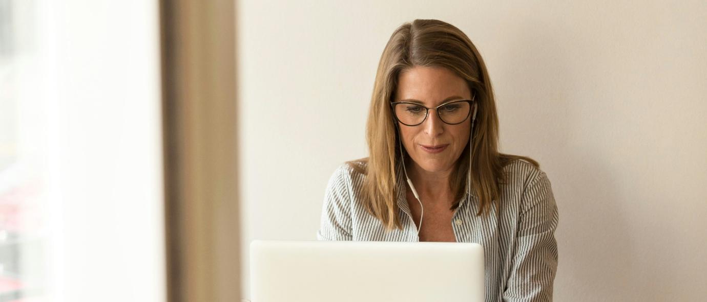 woman sitting at a laptop